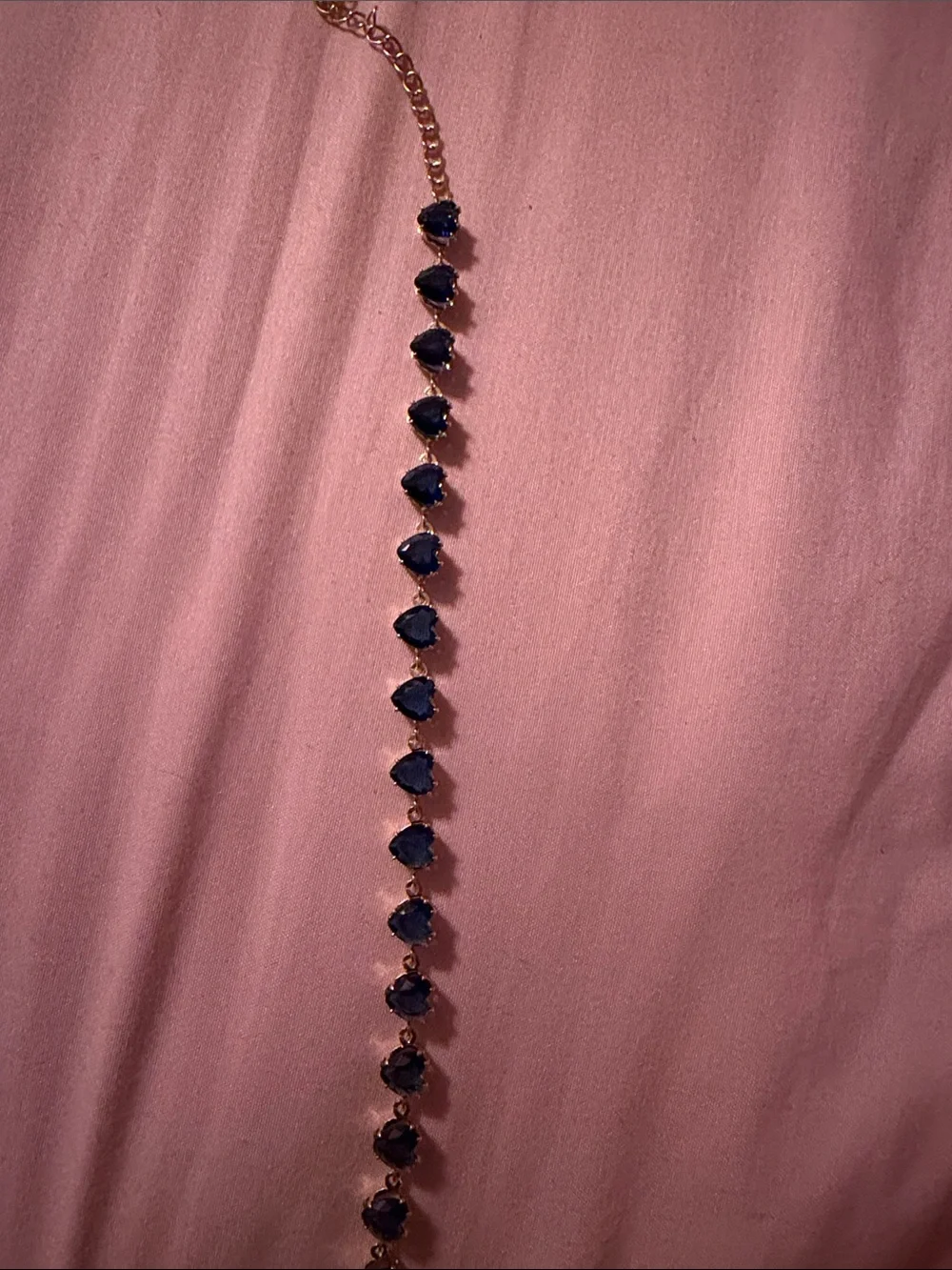Gold Bracelet with Deep Blue Heart Gemstones